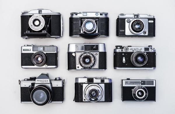 A spread of camera bodies and lenses from a range of manufacturers